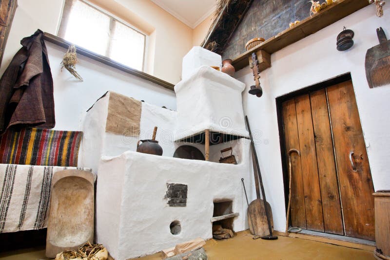 Interior of an old kitchen with a stove royalty free stock photos