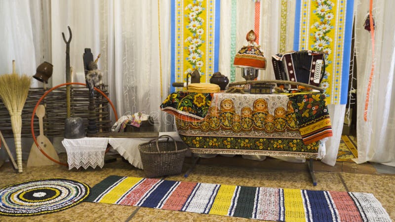 Interior of old Russian hut. Stock footage. Museum of Russian life dips into old fairy tale. Beautiful household items. And ornaments of native Russian people royalty free stock photos