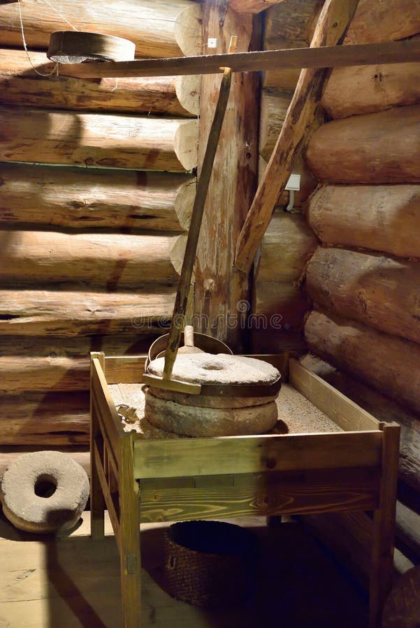 The interior of old Russian log hut in Pushkin Mikhailovskoe. PUSHKINSKIYE GORY, RUSSIA - MAY 18, 2016: The interior of old Russian log hut in Pushkin royalty free stock photo