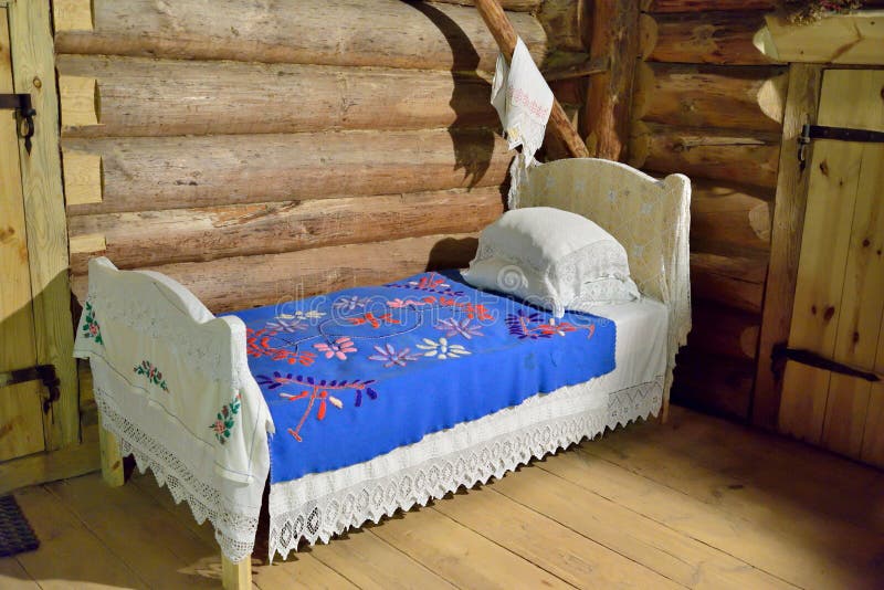 The interior of old Russian log hut in Pushkin Mikhailovskoe. PUSHKINSKIYE GORY, RUSSIA - MAY 18, 2016: The interior of old Russian log hut in Pushkin stock photography