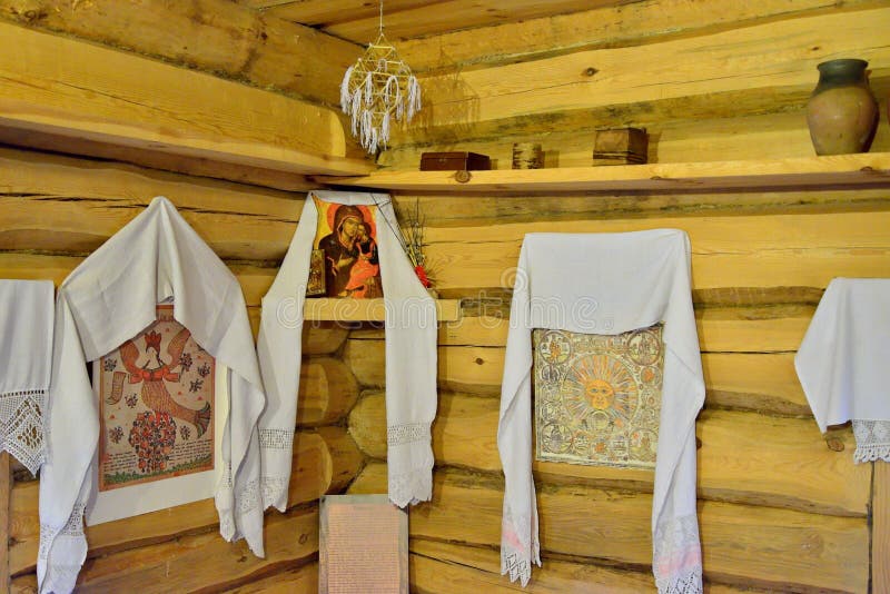 The interior of old Russian log hut in Pushkin Mikhailovskoe. PUSHKINSKIYE GORY, RUSSIA - MAY 18, 2016: The interior of old Russian log hut in Pushkin royalty free stock image