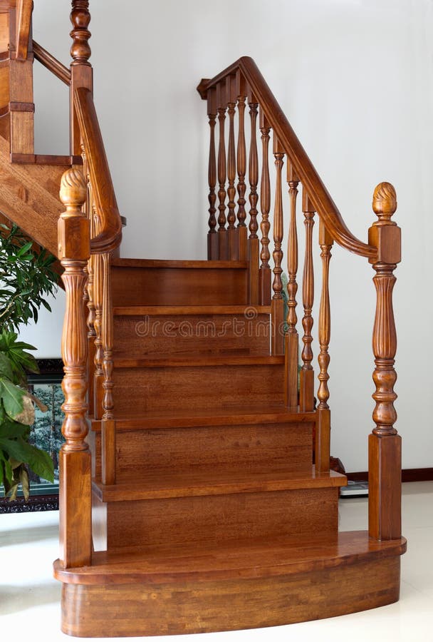 Interior stairs. Interior wooden stairs with Wood handrails royalty free stock photos