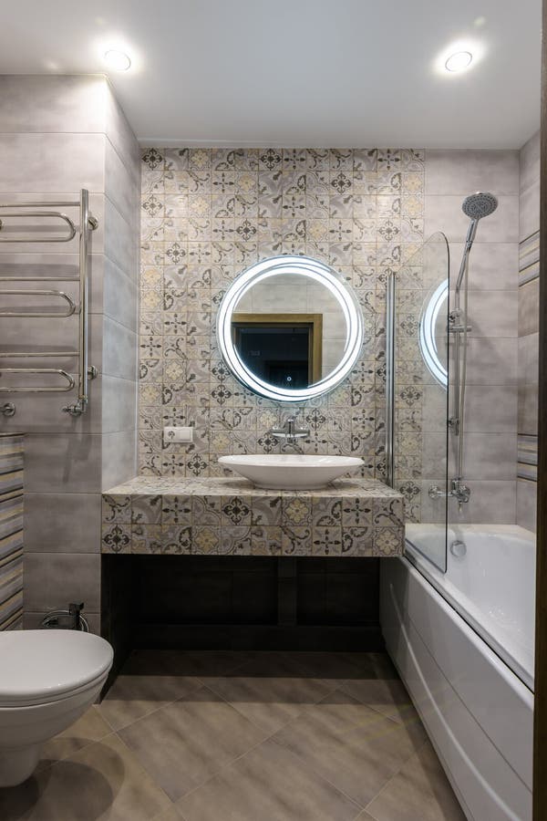 Interior of a stylish modern combined bathroom and toilet. Interior of a stylish modern combined bathroom and  toilet royalty free stock image