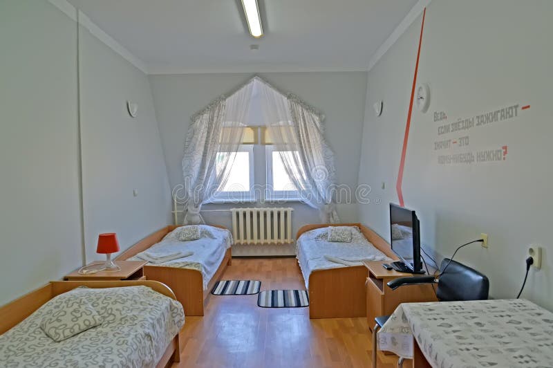 Interior of the triple hotel room in light tones.  stock image