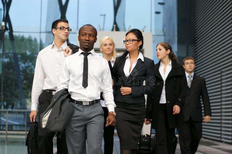 An international business team in formal clothes royalty free stock images