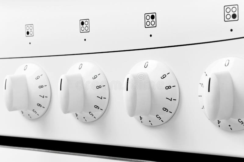 Kitchen baking oven. White kitchen baking oven buttons royalty free stock images