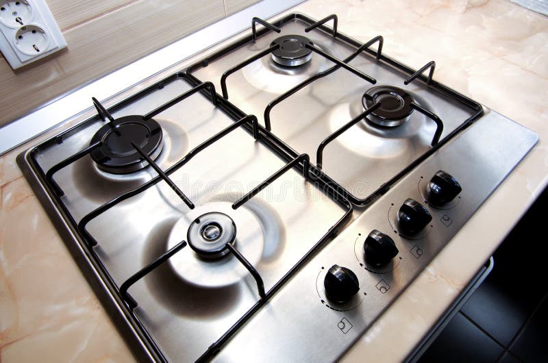 Kitchen stove. Kitchen cooking gas stove made of stainless steel royalty free stock images