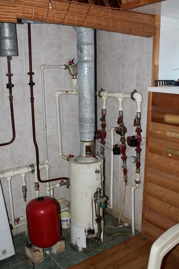 Heating system in a private house from a boiler with plastic pipes stock photography
