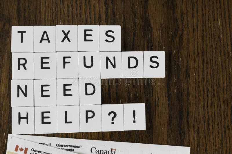 Letter tiles used to advertise tax preparation services. Financial Concepts stock photography