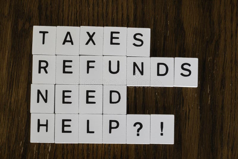 Letter tiles used to advertise tax preparation services. Financial Concepts stock images