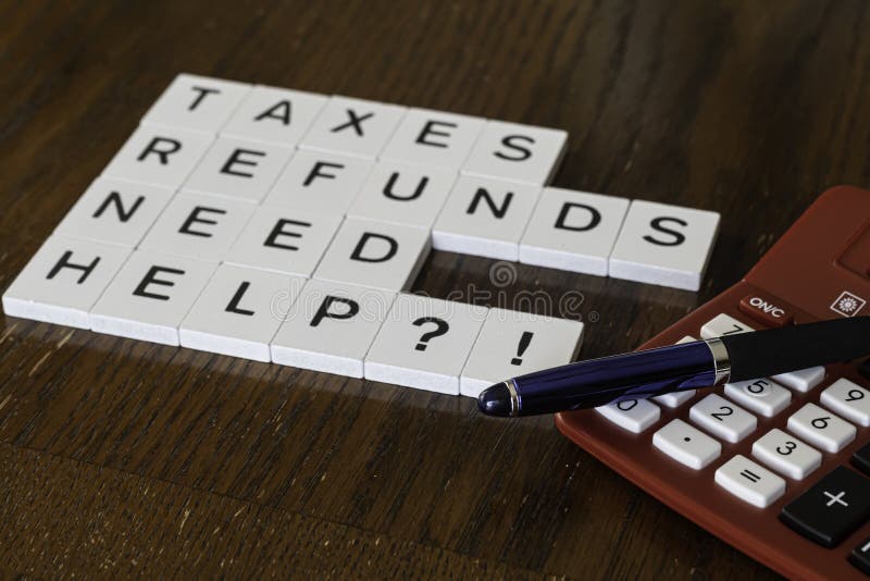 Letter tiles used to advertise tax preparation services. Financial Concepts royalty free stock photography