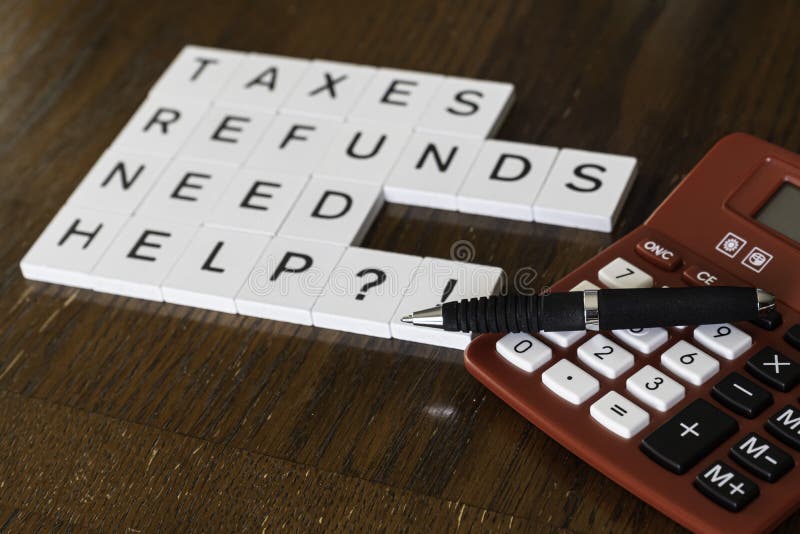 Letter tiles used to advertise tax preparation services. Financial Concepts royalty free stock images