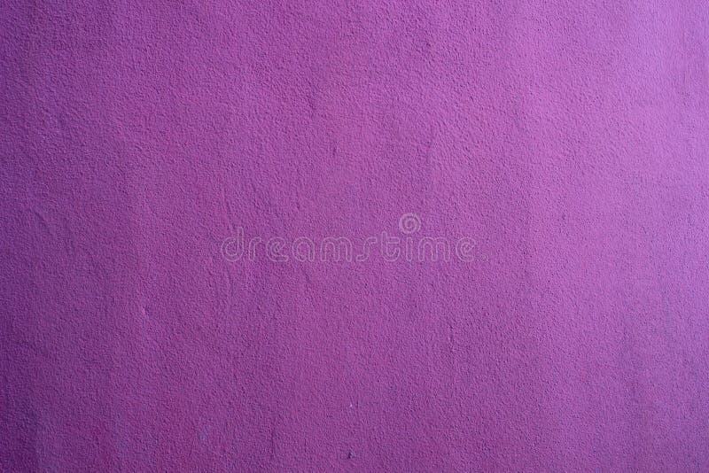 Lila purple plaster wall with a gradient background texture stock photo
