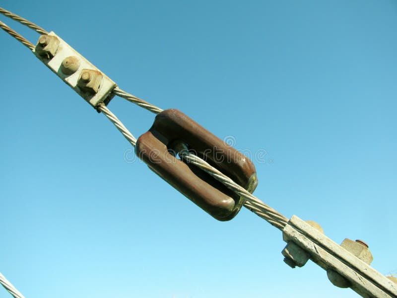Link of the cable pulled against blue sky. Link of the steel cable pulled against blue sky royalty free stock images