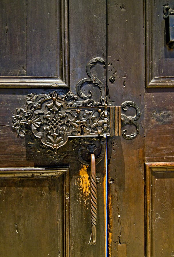 Locking mechanism of an ancient wooden door stock photo
