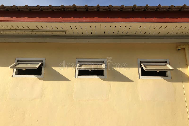 Low angle view of ventilator windows of toilet stock photography