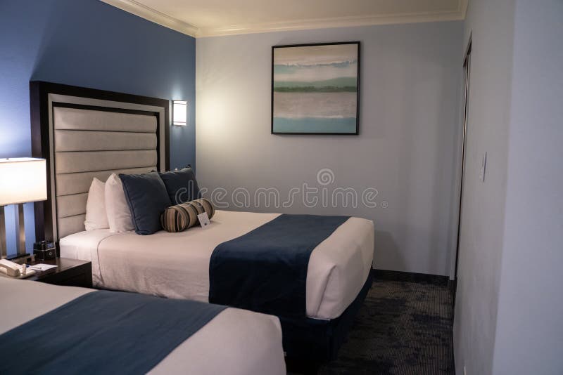 Typical two bed hotel room with queen size beds and modern decor at a Best Western stock photography