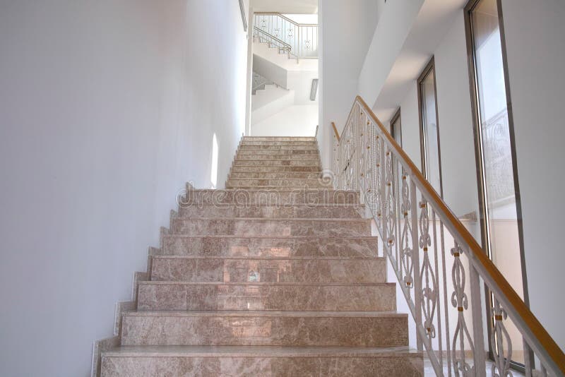 Stairs inside hotel. Brown marble stairs inside hotel stock image