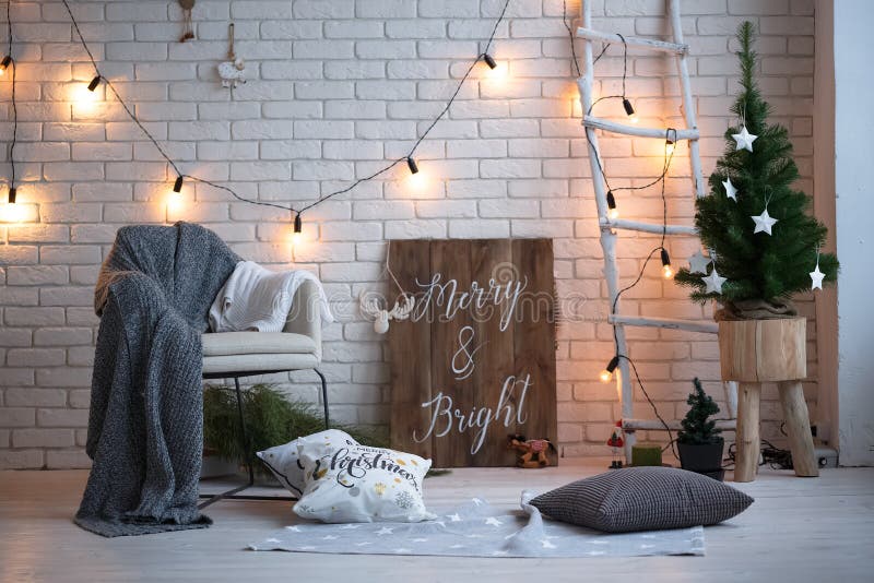 Merry christmas and new year brick wall background. white decor. Loft style.  royalty free stock image