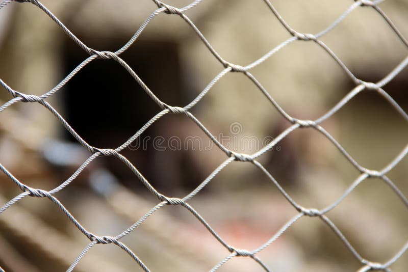 Metal mesh on fence. Wire netting macro. Metal mesh on fence. Mesh fence. Wire netting close up. Wire netting macro. Fence made of wire mesh. wire wall royalty free stock images