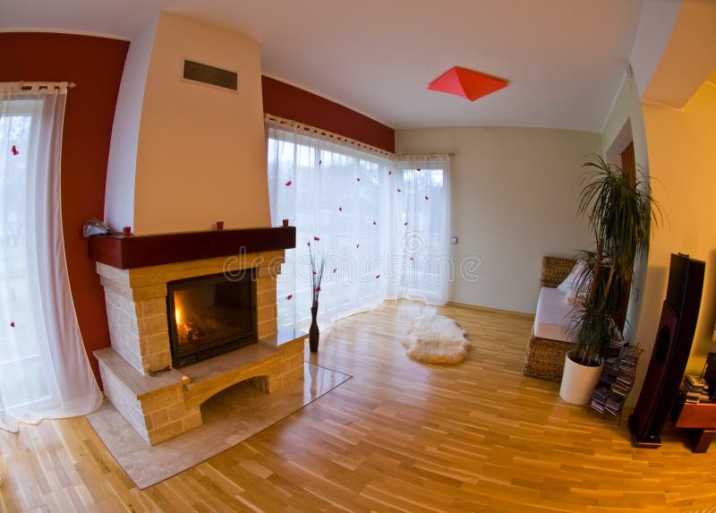 Modern Interiors. A fisheye view of modern interiors with a fireplace stock photos