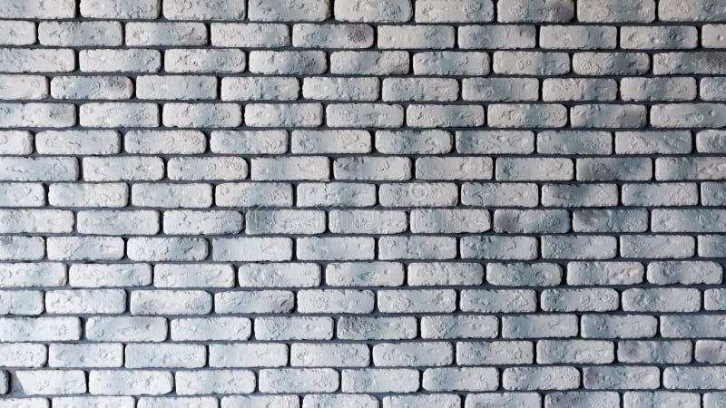 Modern white with gray brick wall texture for background. Abstract weathered texture painted with old stucco light gray and aged royalty free stock images