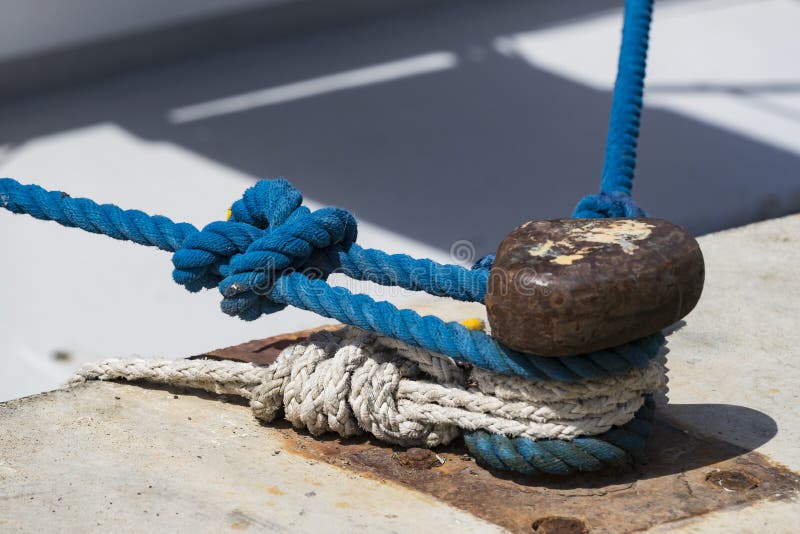 Mooring post in the port for fixing yachts and ships of boats. And caterers stock photography