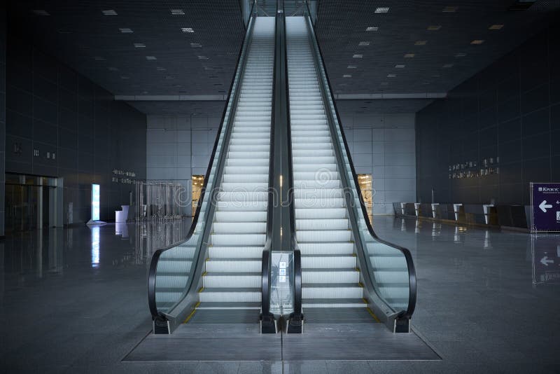 MOSCOW, APR. 19, 2018: Perspective view on metal escalator moving stairs to the second floor in exhibition hall Crocus Expo. Stair. Case in office business royalty free stock images