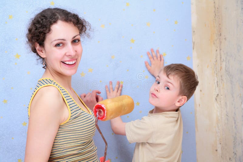 Mother and son repair room. The mother and son repair room royalty free stock photo