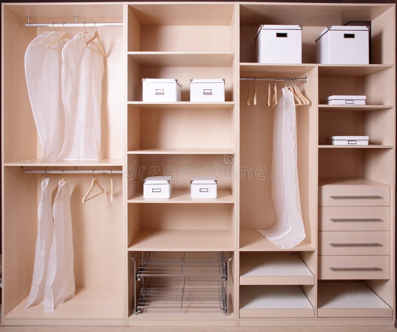 Nice interior of wooden wardrobe royalty free stock photo