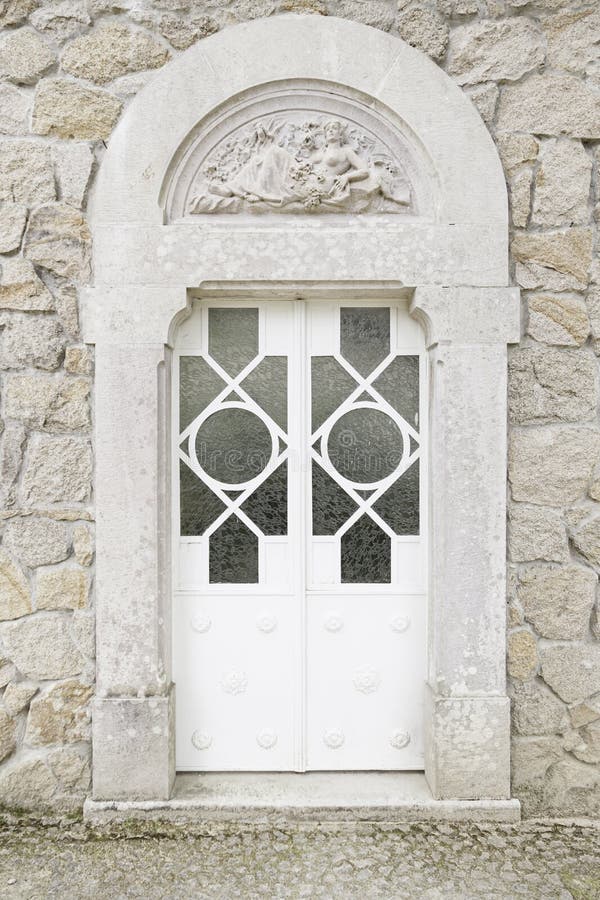 Old closed white door stock photography