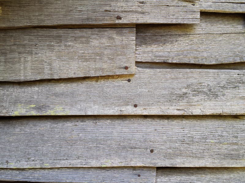 Old wood clapboard siding on abandoned house. Wood clapboard siding on abandoned house royalty free stock image