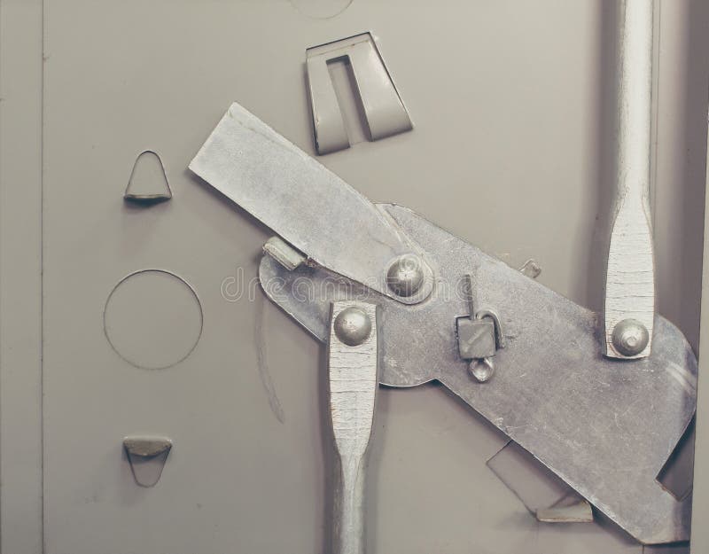 Opening and closing mechanism of steel cabinet stock images