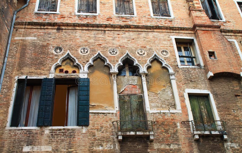 Ornate windows in Venice on an old house. Italy, Europe stock images