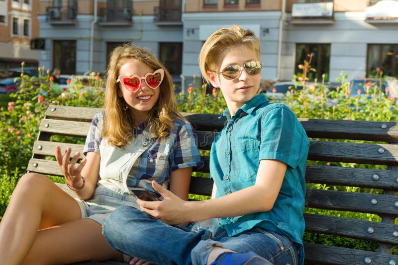 Outdoor portrait of a teenage boy and girl 14, 15 years old. Outdoor portrait of a teenage boy and girl 14, 15 years old stock photography