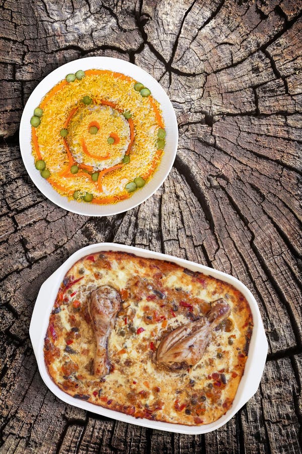 Oven Baked Vegetable Stew With Chicken Meat And Bowl Of Garnished Russian Salad Set On Old Stump Weathered Cracked Top Surface stock photos