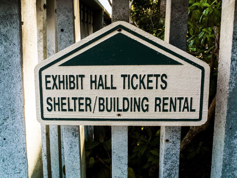 Park Exhibit Hall Shelterand Rental Building Sign on the Boardwalk. Walkway park sign to the exhibit hall, Shelter and Rental Building stock photo
