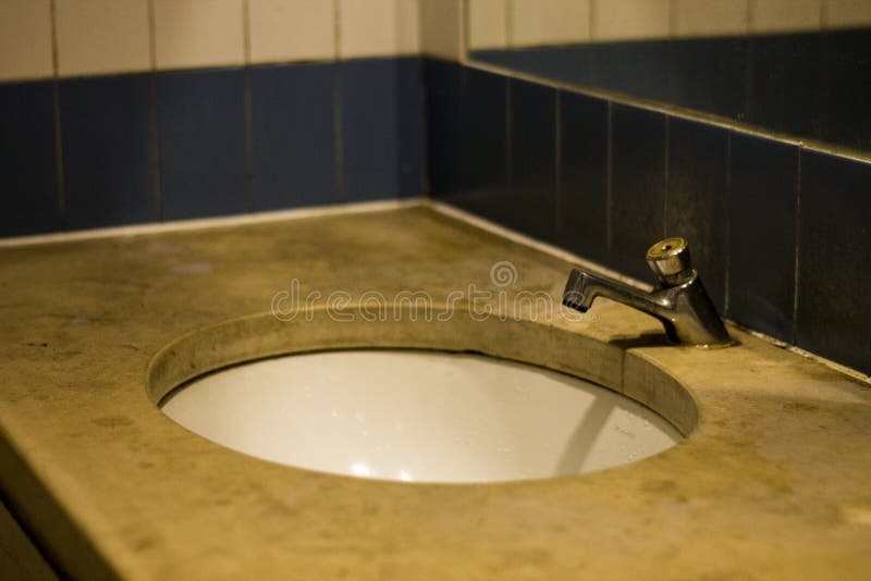 Details photo sepia effect washbasin in train station royalty free stock photo