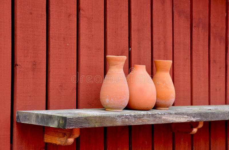 Pottery vases on shelf. royalty free stock photo
