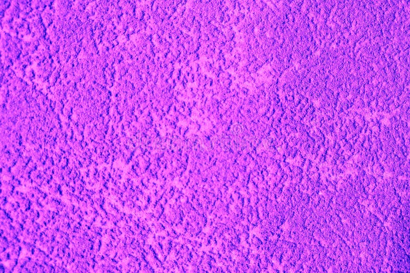 Purple decorative plaster. The texture of the plaster woodworm. Abstract rough background royalty free stock photos