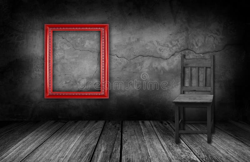 Red frame and wood chair in interior room with gray stone wall.  stock photography