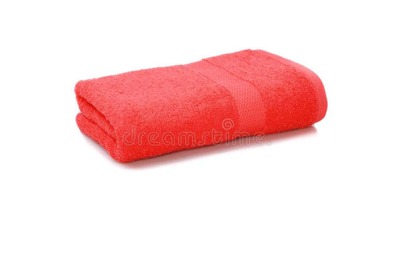 Bath towel isolated on white background. Red towel folded isolated on white background. bath towel isolated on white royalty free stock images