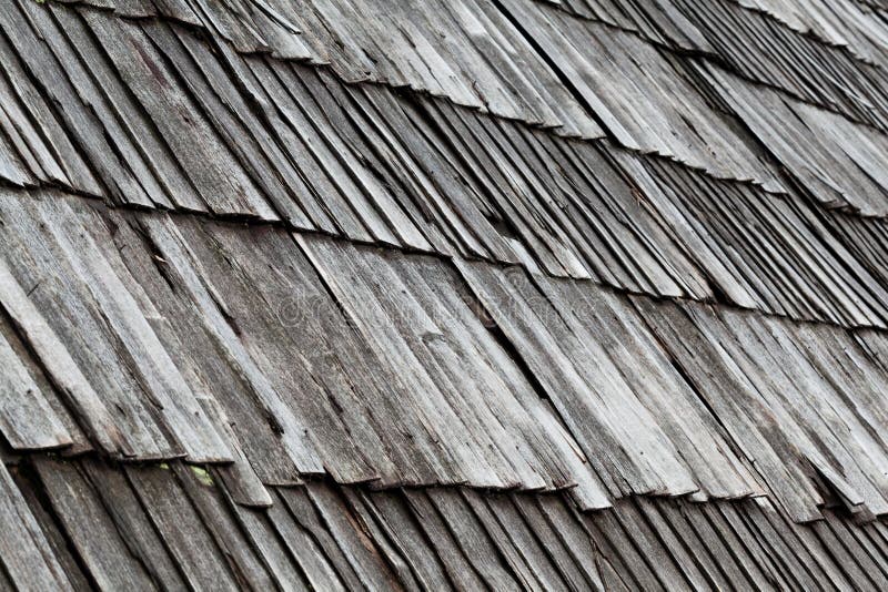 Roof covering from old gray wooden planks royalty free stock photos