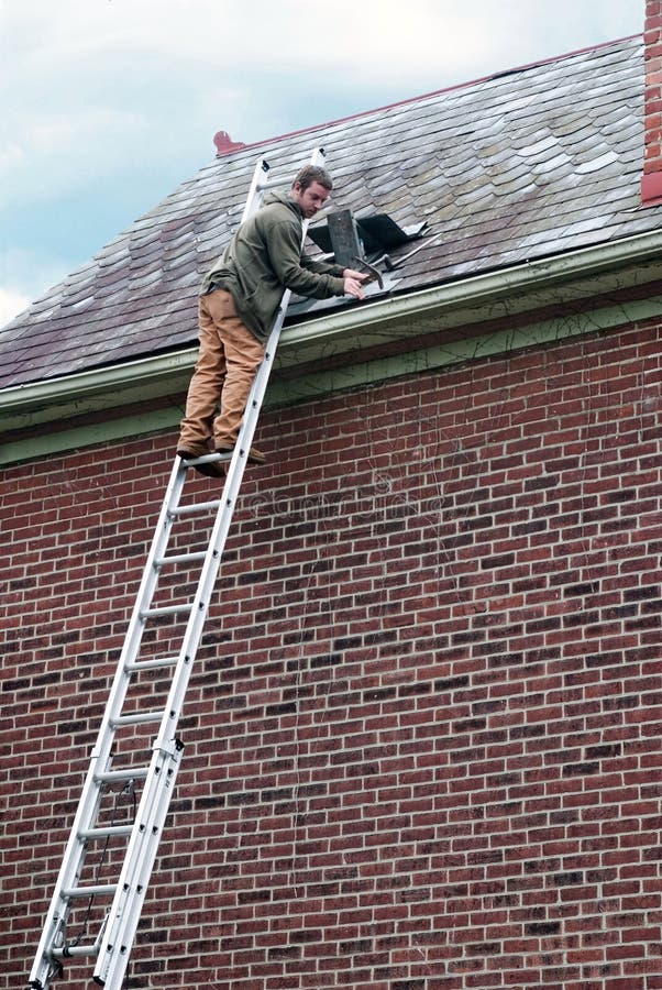 Roof Worker on Ladder stock photos