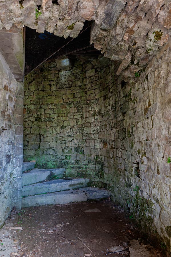 Ruins winding stairs spiral staircase medieval castle Franchimont, Theux, Liege, Belgium. Ruins of winding stairs or spiral staircase with a wall in nature brick stock photo