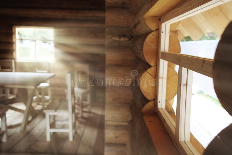Rustic interior wooden house. Made of logs stock image