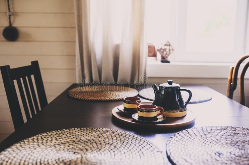 rustic kitchen in brown and grey tones in modern farmhouse ot cottage stock photography