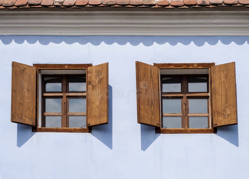 Rustic wood windows. In Viscri, Romania royalty free stock photo