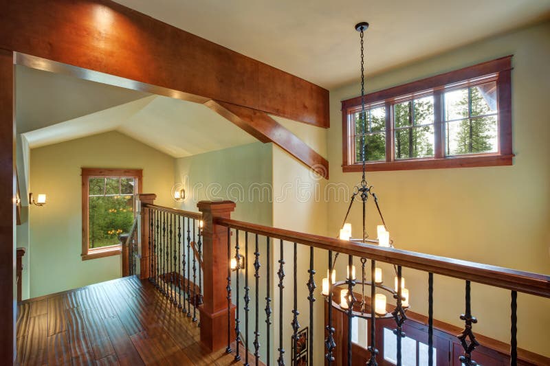 Second floor landing features stained handrails royalty free stock images