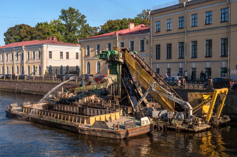 St. Petersburg, Russia - September 24, 2017: Work to deepen the bottom in the channel of the urban river Moika. stock image